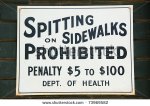 stock-photo-spitting-on-sidewalks-prohibited-sign-on-a-brick-wall-73969582